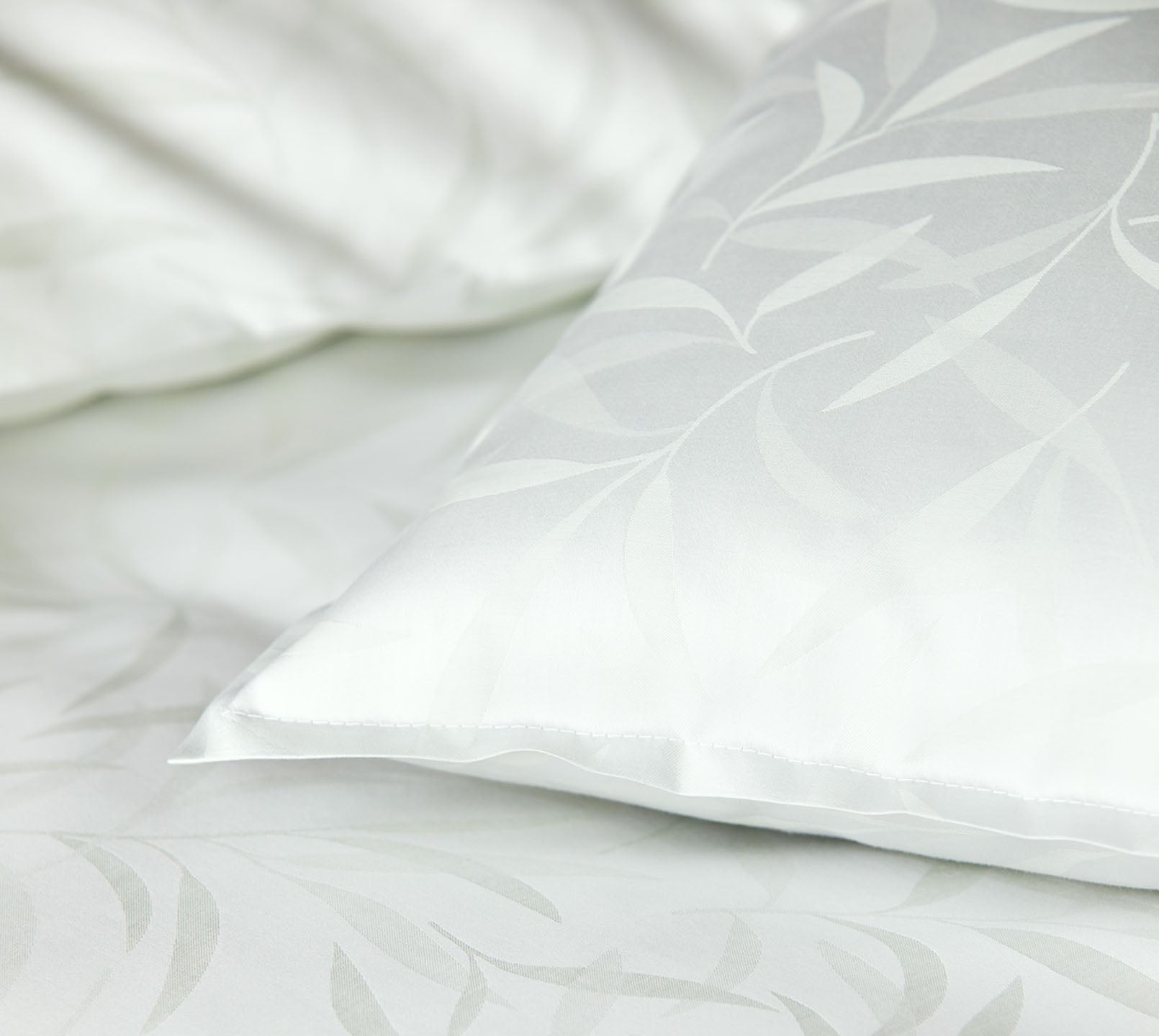 Jacquard Bettwäsche Muriel in Hellgrün Blätter Detail #farbe_Muriel Pastellgrün