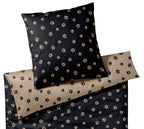 Satin Wende-Bettwäsche Paws in Schwarz-Beige Hundepfoten Freisteller #farbe_Schwarz-Beige